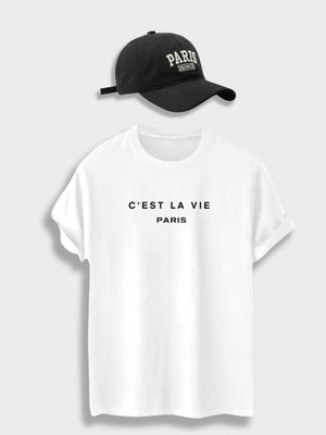 White shirt with black cap